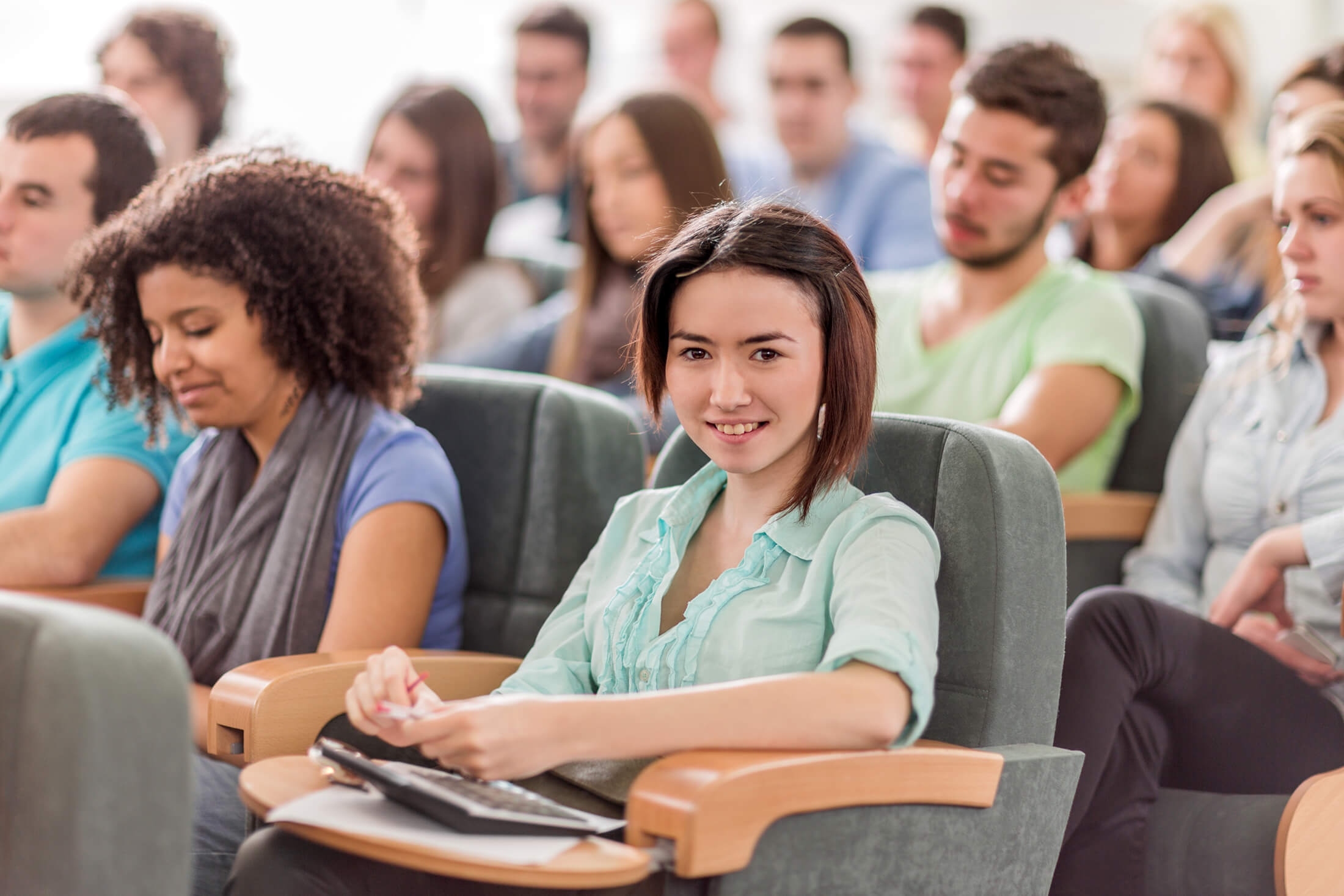 a student looking at the camera and smiling