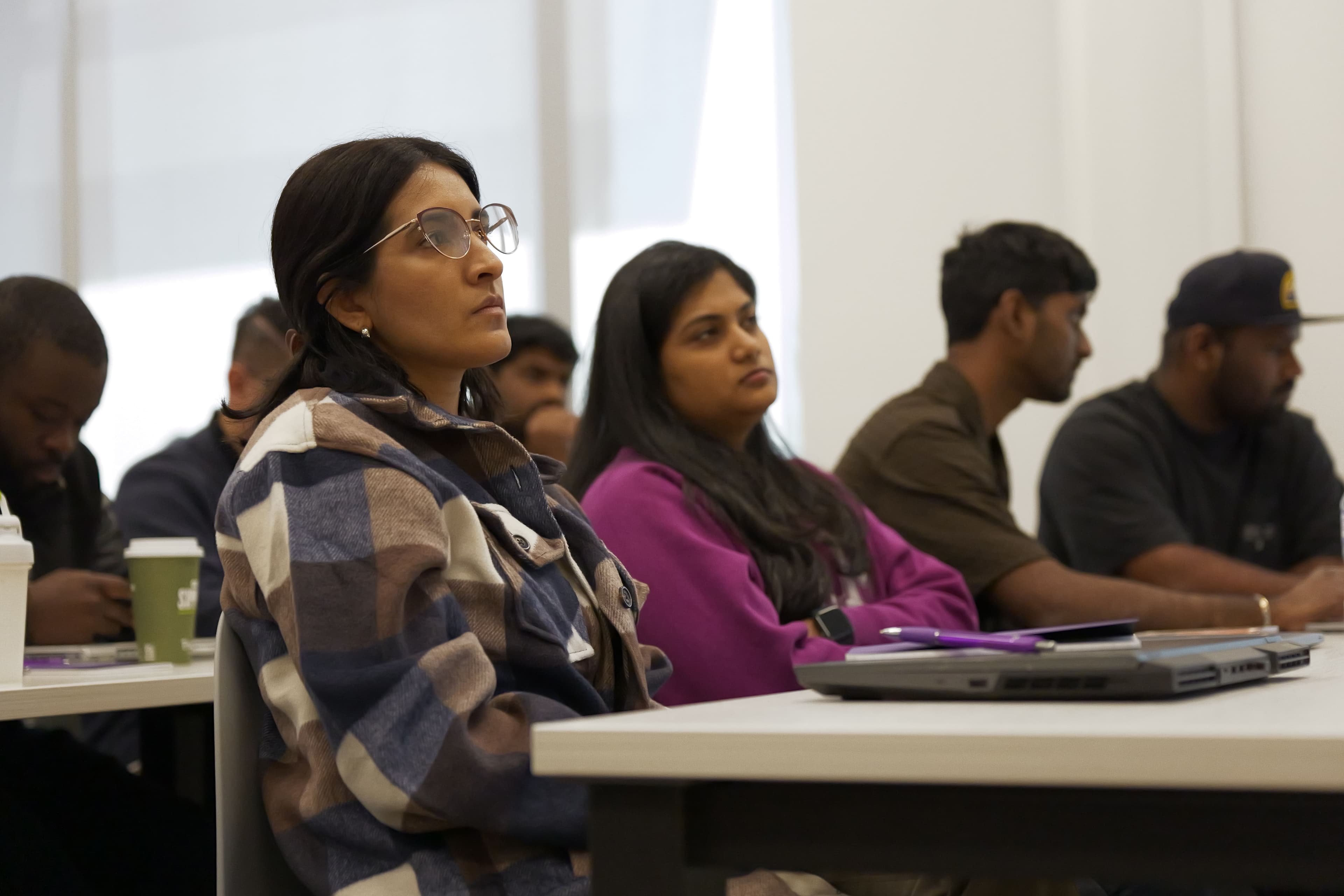 Students listening attentively during a session.