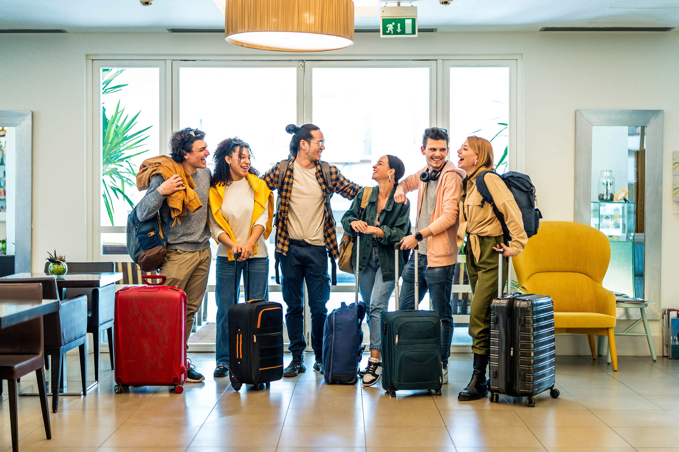 students laughing and in the airport